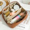 Вместительная косметичка с диагональной застежкой CosmyCase, коричневая